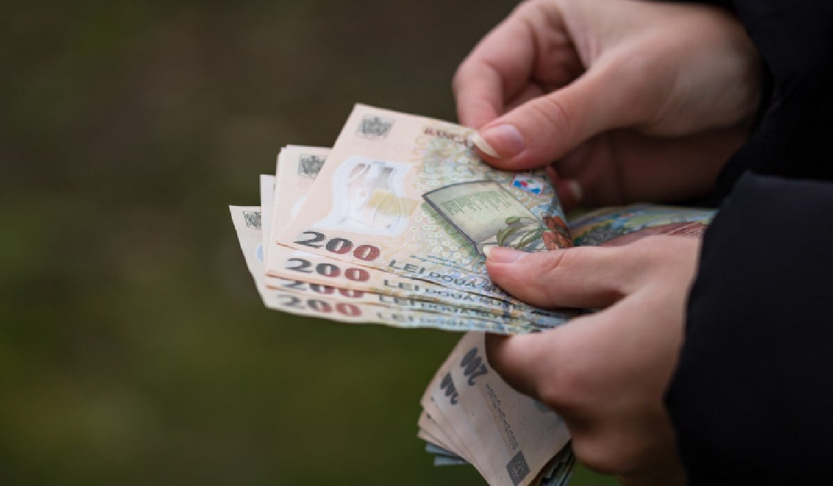 Românii vor putea retrage 500 de lei cash, de la magazinele sătești, dar există niște condiții